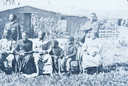 Family in Front of Their House