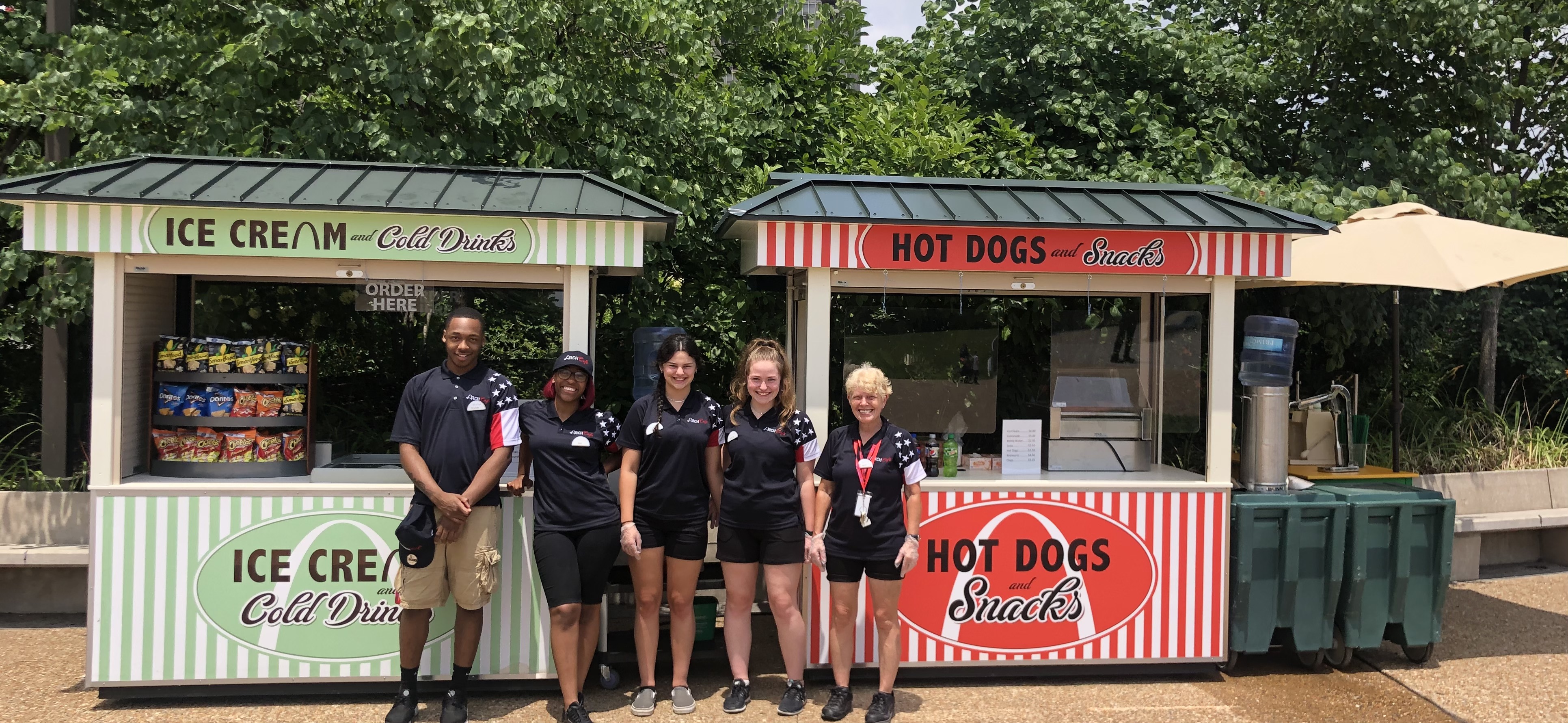 Employees at the outdoor wagons of the Arch Cafe.